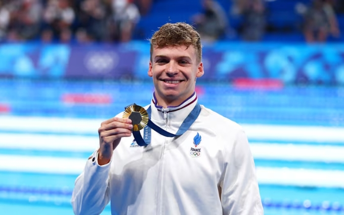 Léon Marchand Breaks Olympic Record with 200m Medley Gold